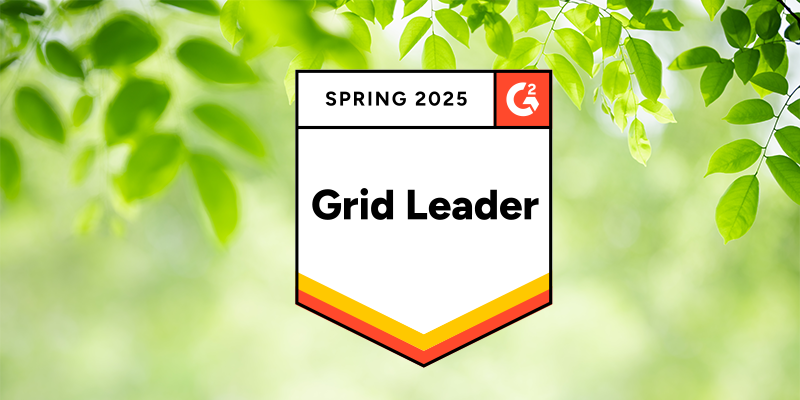 A badge prominently labeled "Spring 2025 Grid Leader" is featured against a backdrop of green leaves, symbolizing growth and success. The badge highlights its top-ranking achievement in the G2 2025 Spring Report, indicating a significant accomplishment in the business or software sector. The vibrant greens convey a fresh and thriving atmosphere.